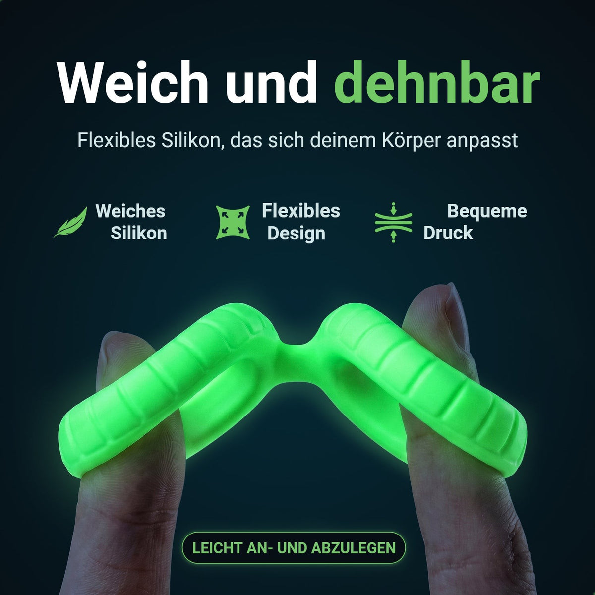 Glowloop Dual Cockring aus weichem, dehnbarem Silikon, zwischen zwei Fingern gedehnt